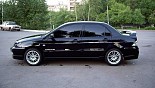 轮毂 OZ Racing Ultraleggera 在汽车上 Mitsubishi Lancer