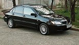 轮毂 Racing Wheels Classic H-155 在汽车上 Mitsubishi Lancer 轮毂 Racing Wheels Classic H-155 在汽车上 Mitsubishi Lancer