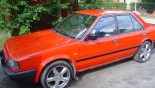 轮毂 Dezent F 在汽车上 Nissan Bluebird