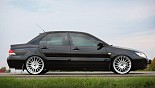 轮毂 OZ Racing Superturismo GT 在汽车上 Mitsubishi Lancer EVO 9