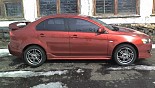 轮毂 Kosei D-Racer 在汽车上 Mitsubishi Lancer X
