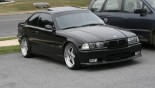轮毂 OZ Racing Mito Rosso 在汽车上 BMW 3 Coupe(E36)