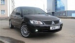 轮毂 OZ Racing Superturismo GT 在汽车上 Mitsubishi Lancer