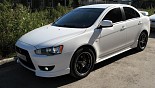 轮毂 Kosei OP Magnum 在汽车上 Mitsubishi Lancer X